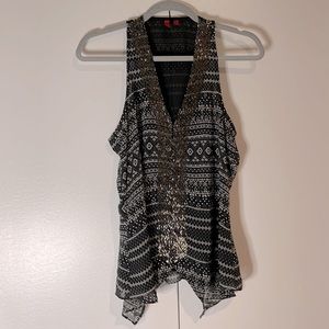 Unique beaded going out top; black patterned;size M